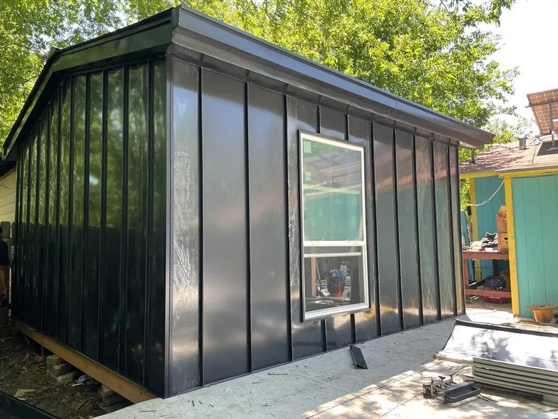 Black standing seam metal wall panels for Metal Roof Installation in Progreso